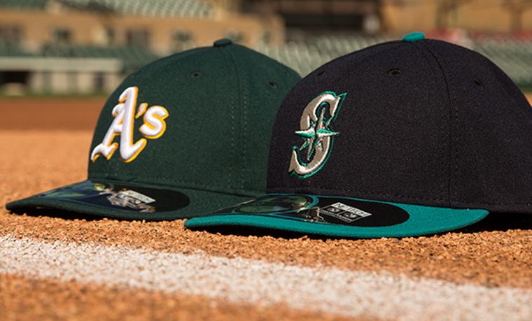 New Era Caps der Oakland Athletic’s und den Seattle Mariners.